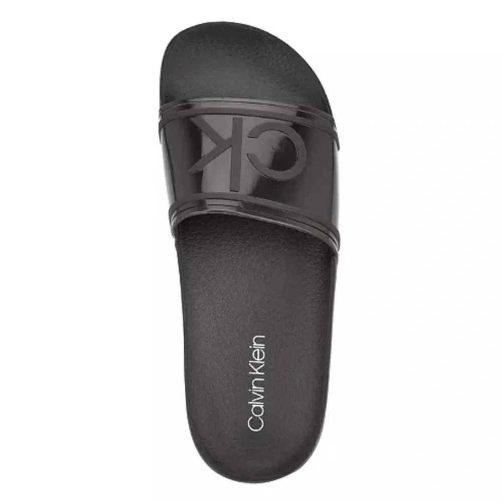 Calvin Klein Women's Austin Translucent Jelly Logo Pool Slides.